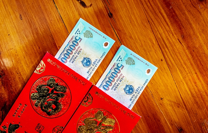 nguoi lon lam hu tre bang li xi